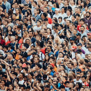 Large groups of people. Credit Chuttersnap