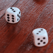 Two white dice to play fun table activity. Photo credit: Lea Bohm