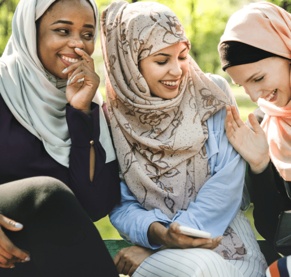 Three women laughing to demonstrate take your time and laugh