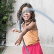 Girl swinging hula-hoop, as ideal summer professional development for teachers. Photo credit: Patricia Prudente