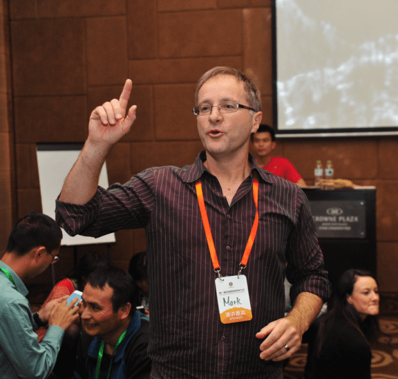 Mark Collard presenting a keynote facilitator training workshop in China