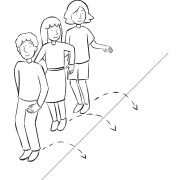 Group of people jumping to one side of a rope on ground, as expected in Salt & Pepper exciting warm-up game