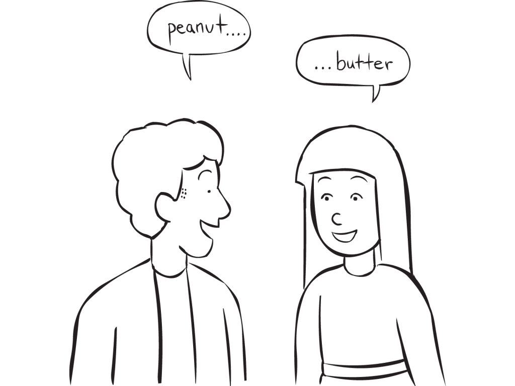 Two people talking to each other in fun trust-building game of Hog Call