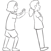 One person leaning back into the arms of another as expected in trust development exercise called Trust Leans or Trust Rocks