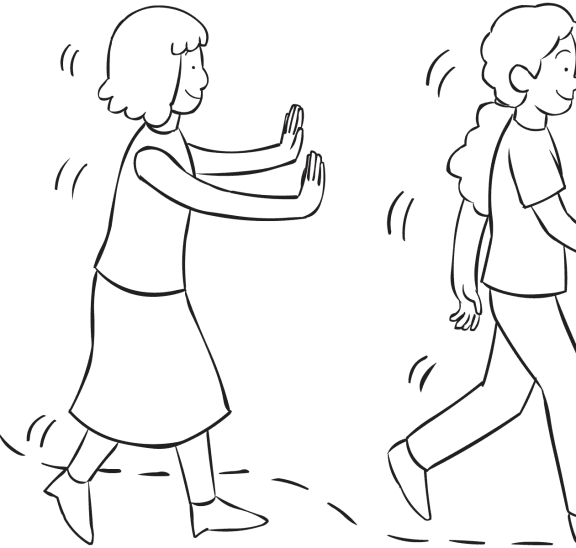 One woman spotting behind another woman as part of Walk and Lean active trust-building game