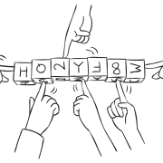 Set of wooden blocks lined up and held by a series of fingers in block-building challenge of Block Party