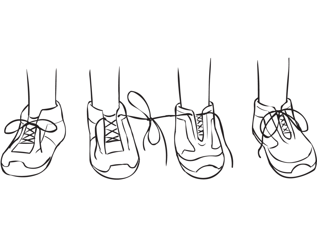 Two pairs of shoes with laces of two shoes tied together, as featured in creative partner exercise called Tiny Teach