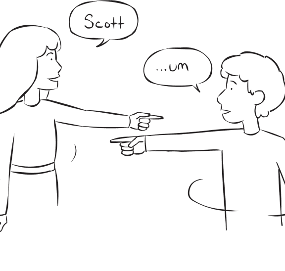 Two people pointing to each other as part of movement name game Name Roulette