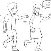 Man tagging a woman in active name game of Name Tag