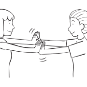 Two women involved in partner stretching exercise Isometric Stretch to warm-up their bodies