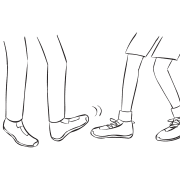 Two people trying to tag each others feet in quick partner tag game called Toe Tag game