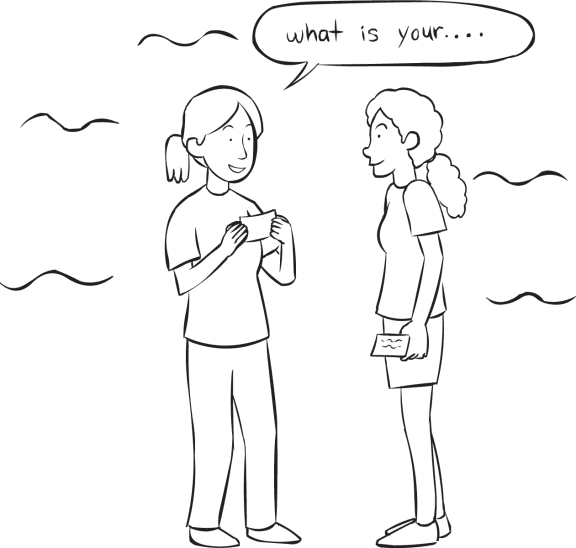 One person asking another a question printed on an index card as featured in conversational icebreaker activity Ice-Breaker Question Exchange