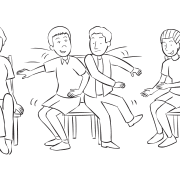 Two men bump into each other as they attempt to sit on same chair in fast game of The Wave fun group energiser