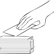 Hand picking up an index card, as featured in active team challenge activity 52 Card Pick-Up