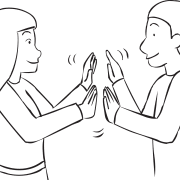 Two people clapping hands with each other as seen in Clap Trap rhythmic energiser game