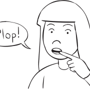 Woman pulling finger from mouth to make plopping sound, as occurs in fun group energiser PDQ Test
