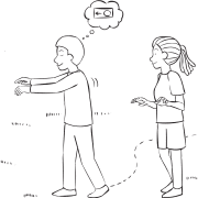 One person leading a blind-folded person on a walk as part of partner trust-building activity Pairs Compass Walk trust-building exercise