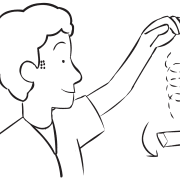 Man demonstrating the flight of a Tumblewing Glider unique paper-plane activity