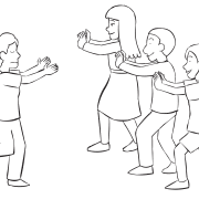 Group of spotters waiting to stop blindfolded person running in trust-building challenge of I Trust You, But...