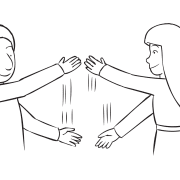 Two people waving their arms in front of themselves in chopping motions as part of Slice and Dice exciting trust-building challenge