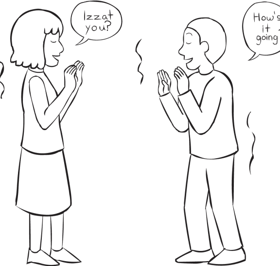 Two blind-folded people playing the trust-building group game Izzat You?