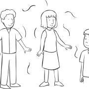 Man winking at another person in group, as seen in fun elimination game of Wink Murder