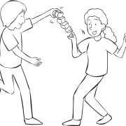 Two people holding set of wooden blocks between their hands moving to fun partner activity called Bust A Move