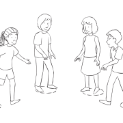 Group of people moving places in a circle, as seen in problem-solving activity called Commitment