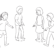 Group of people moving places in a circle, as seen in energetic circle game called Commitment