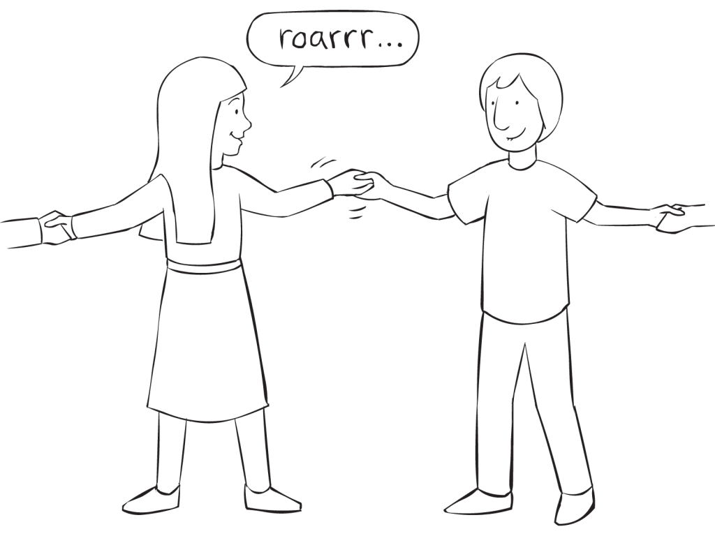Two people holding hands playing fun circle energiser game called Dinosaur Game