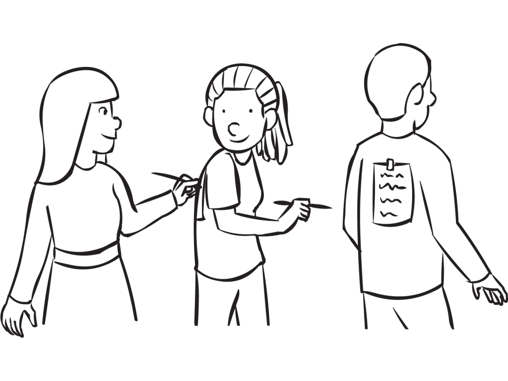 People with notes stuck to their back playing a fun trust-building activity Talking Behind Your Back