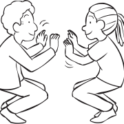 Two people squatting on the balls of their toes facing each other in a fun partner energiser called Squat Thrust game