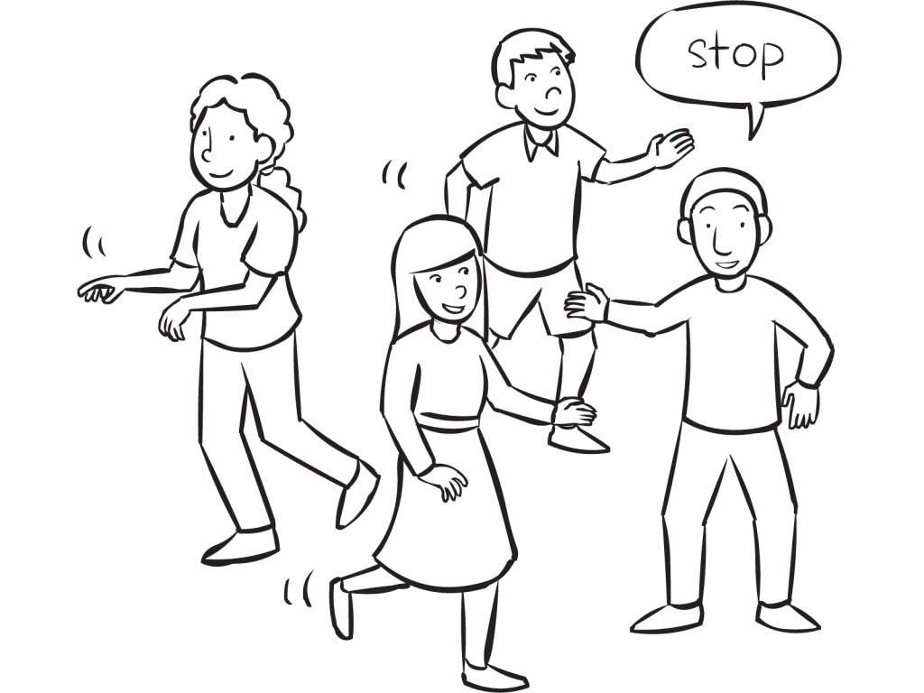 People moving about an area as part of fun group energiser called Stop & Go