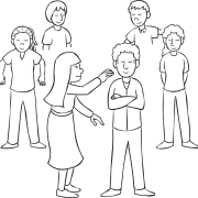 Woman creeping up to a man with his eyes closed as part of suspenseful group game Ghost