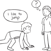 Man demonstrating an action to a woman in active energiser game Do As I say game