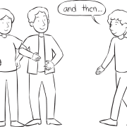 Man walking over to two interlocked people in Build A Story group storytelling activity