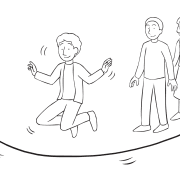 Man jumping as part of energetic group initiative turnstyles rope with two others watching from the sidelines