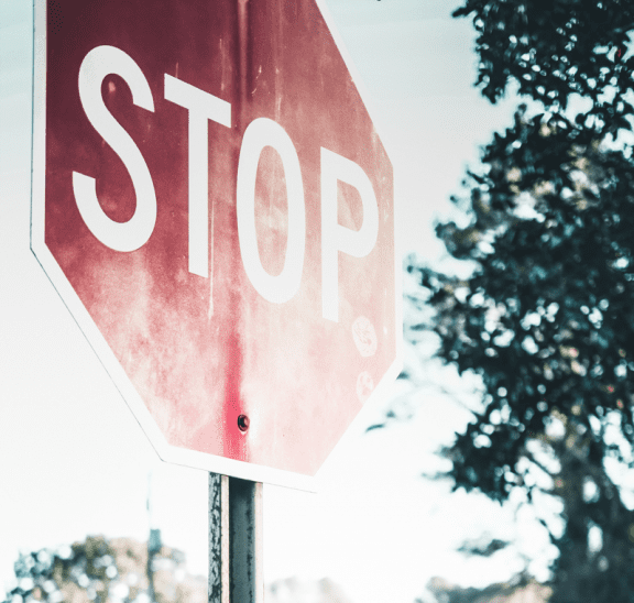 Stop sign indicating when is a good time to stop an activity,, ideally to stop an activity before it wanes