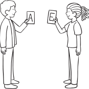 Two people holding letters cards as part of Letter Connection icebreaker game