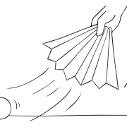 Hand waving a sheet of paper as part of energetic team game Mighty Wind