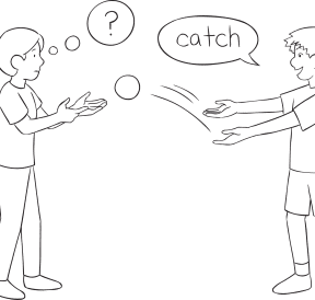 Two pleople passing a ball as part of Push Catch group game