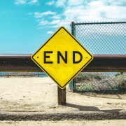 Road sign pointing to end long-term programs. Credit: Matt Botsford