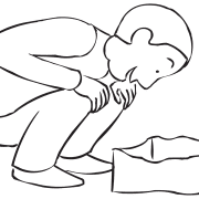 Man bending down playing Paper Bag Pick-Up fun challenge game.