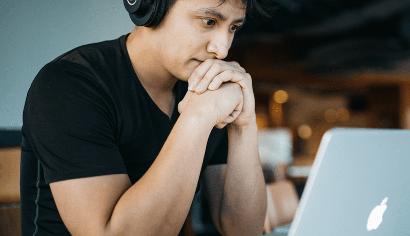 Man part of webinar doing online interactive exercises