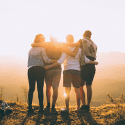 Small group team building activities in the sunset