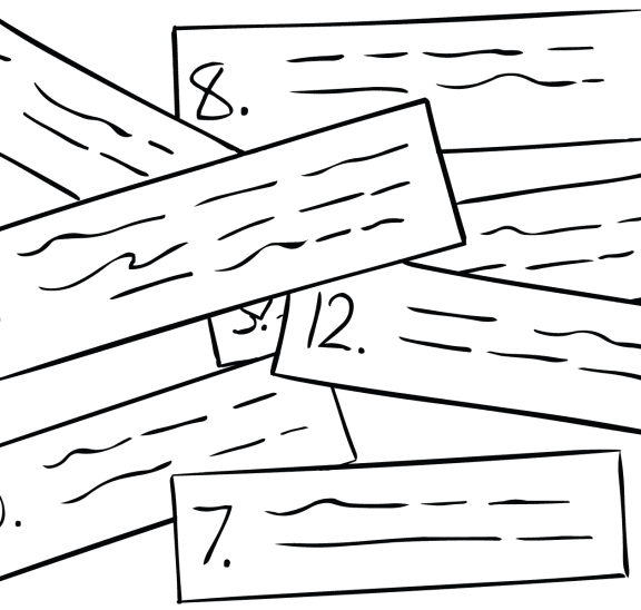 Twelve Bits of little strips of paper with numbers & words, representing fun team puzzle