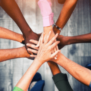 Community of hands meeting in middle