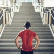 framing is everything for man standing at base of stairs