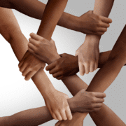 Linked arms working towards community building games