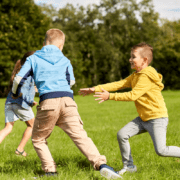 Kids playing tag outside